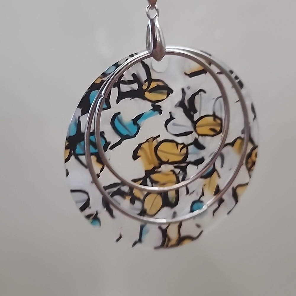 long necklace painted disc and silver hoops